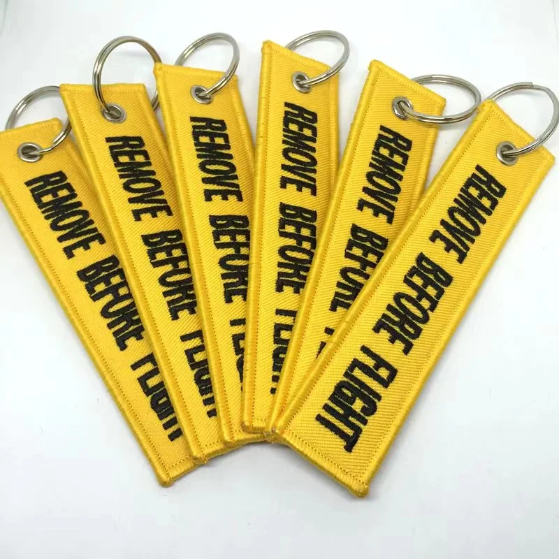 SOMEHOUR 12 PCS Wholesale Aviation Keychain Remove Before Flight Both Embroidery Backpack Accessory For Motorcycles Cars Key