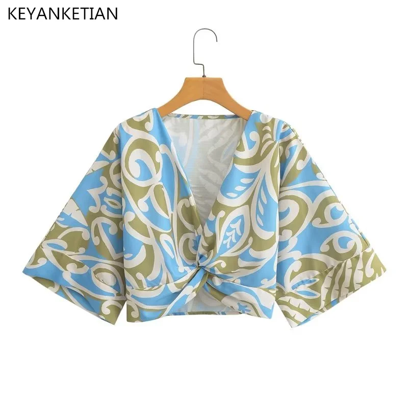 

KEYANKETIAN Summer New Asymmetric Knot Design Printed Shirt Resort Style Women V-Neck Flared Cuff Pullover Top Short