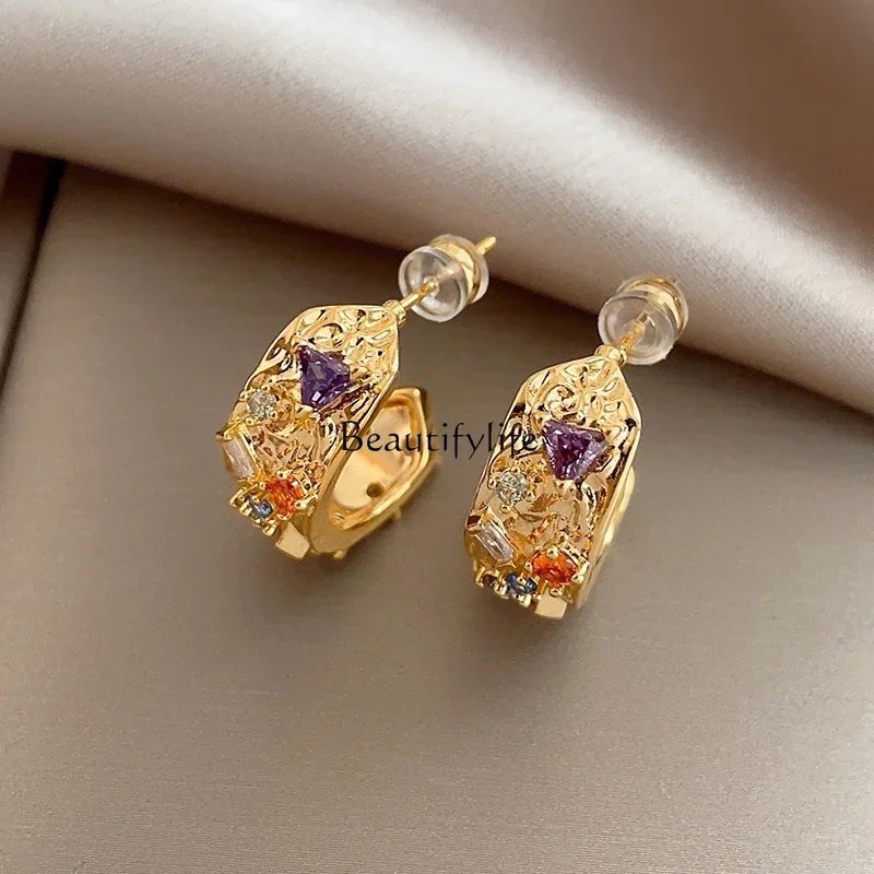 

Niche retro color zircon stud earrings light luxury temperament arc metal heavy industry earrings