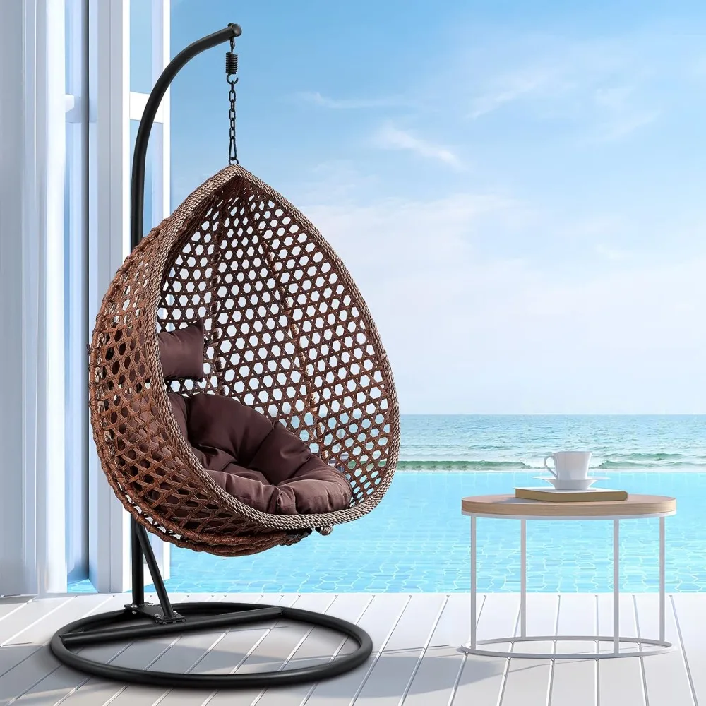 

egg-shaped wicker hanging chair with stand and cushions for indoor swinging comfort