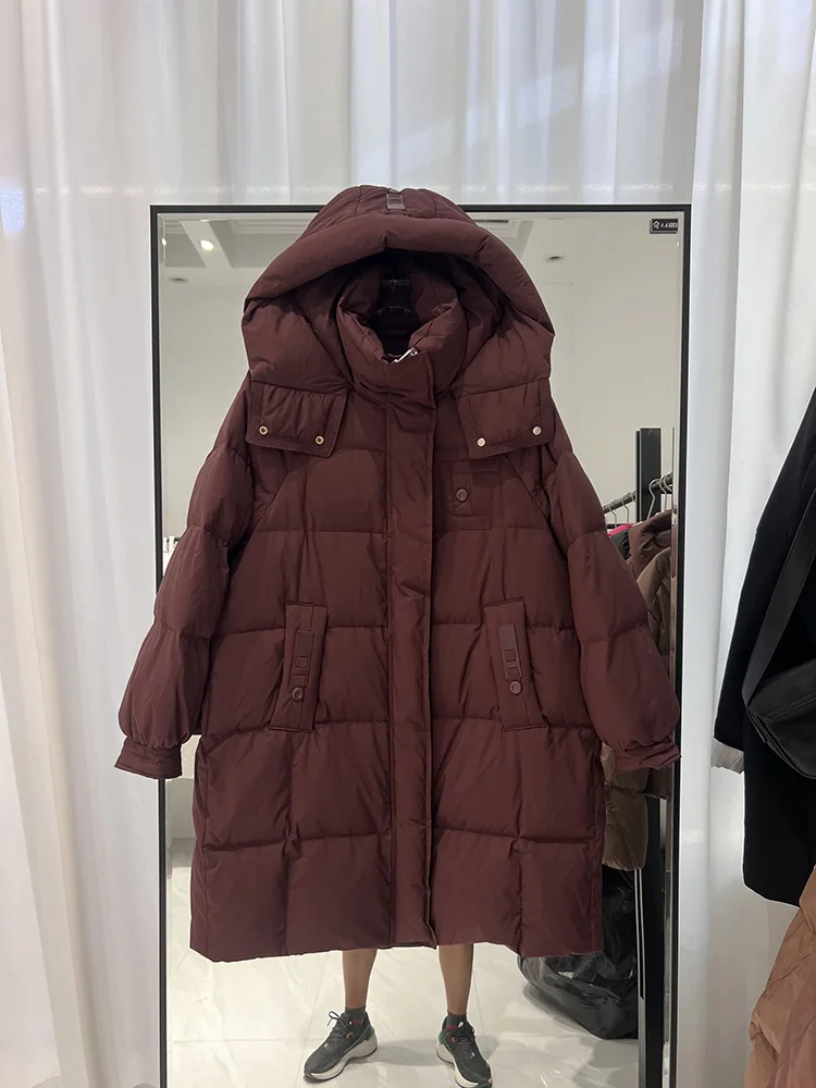Piumino invernale nuovo da donna medio a lungo edizione coreana felpa con cappuccio alla moda addensata allentata versatile piumino d'anatra bianco