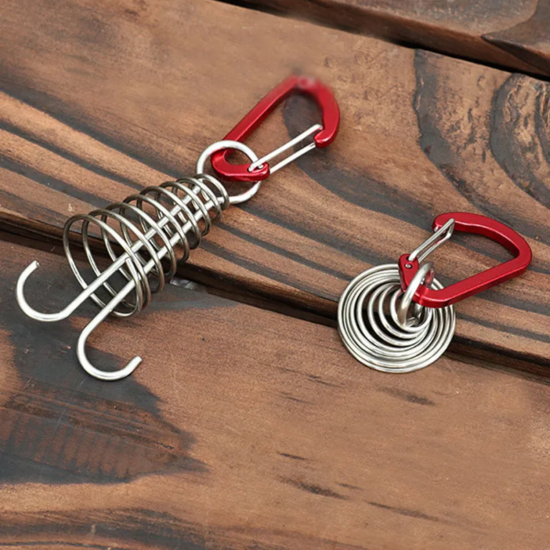 4 piezas de hebillas de fijación para cuerdas de tenda, tipo pulpo, para uso en exteriores, con clavos de madera para rellenar huecos en cubiertas y ganchos con resorte para cuerdas de tenda.