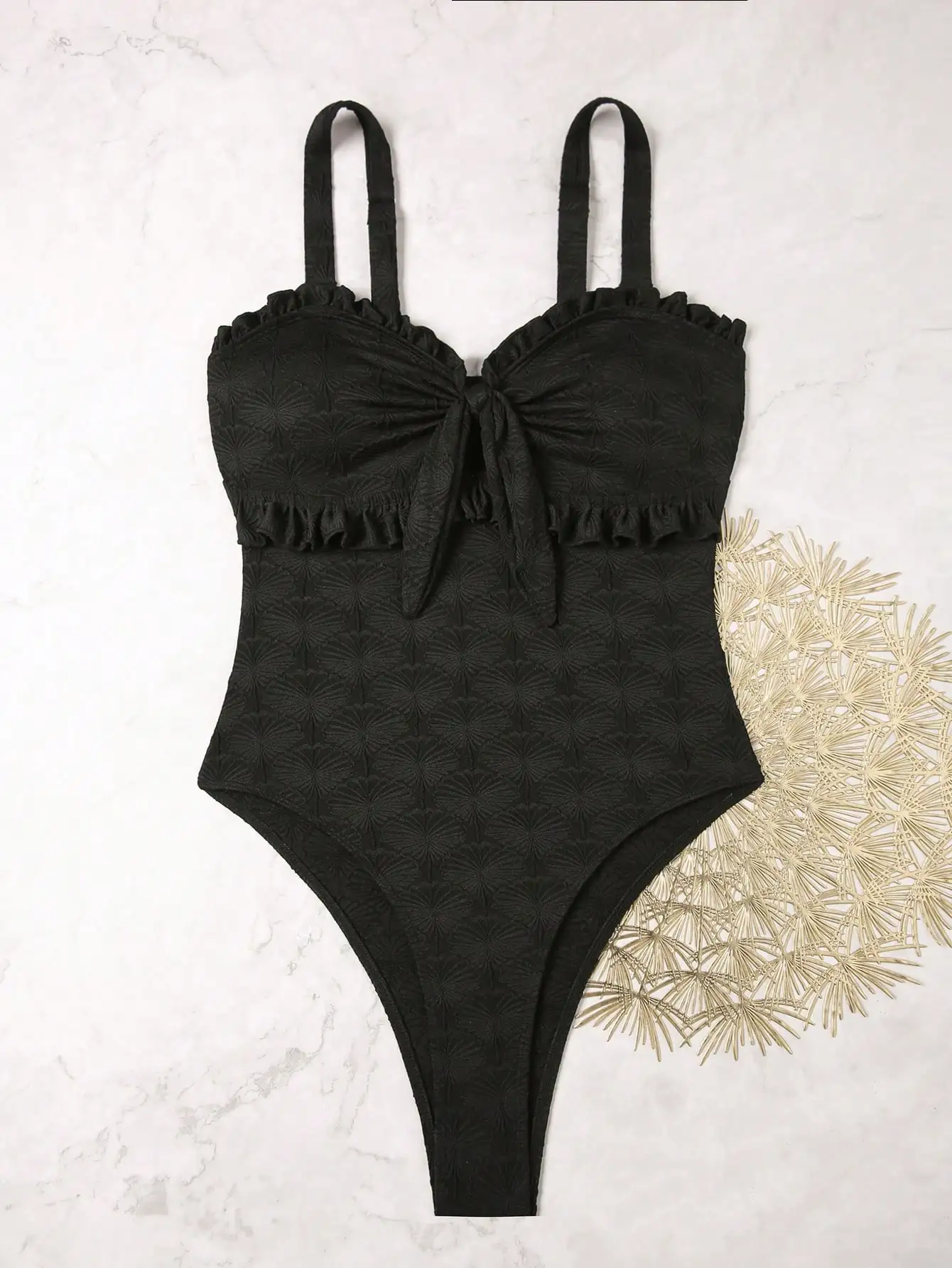 

Женский черный слитный купальник с высоким вырезом, оборками и бантом