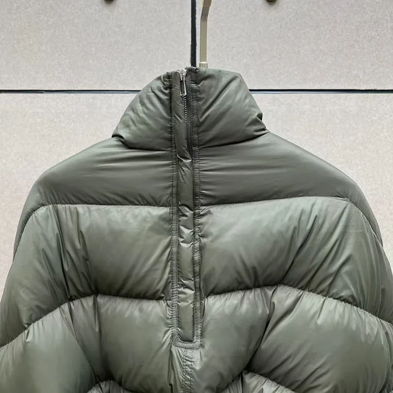 سترات نسائية شتوية جديدة 2025 برباط علوي فضفاض برقبة عالية سترة نسائية 90 بطة بيضاء مملوءة معطف سميك دافئ معاطف للأسفل