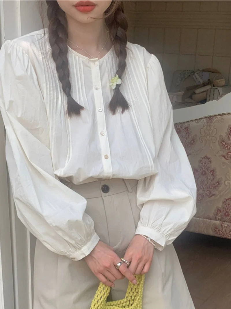 

Chic Sweet round Ne Long Sve Loose Women's irt Design Sensation Bubble Sve Spring Top Korean Sle Commute Pure Color