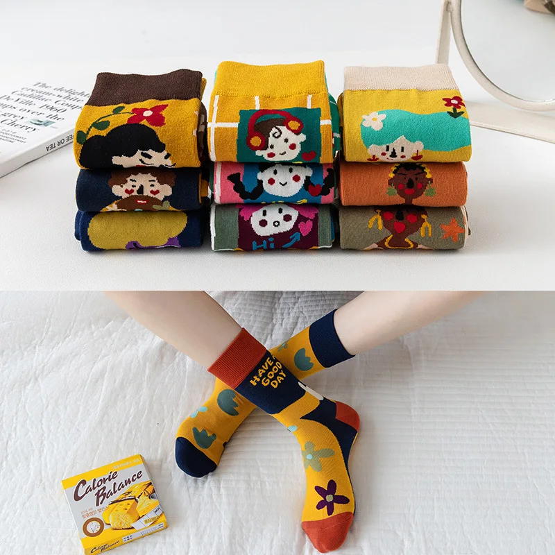 A pair of male and female asymmetrical AB new fashion Harajuku high quality high tube socks creative cartoon cotton socks