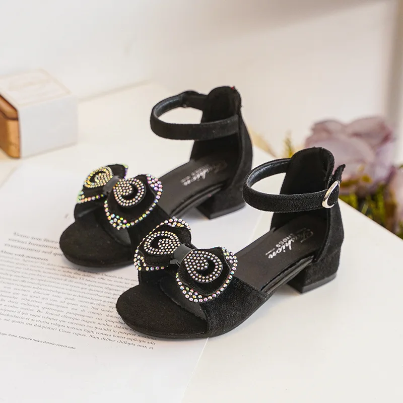 Sandali da ragazza estate nuovo tacco alto scarpe da principessa con suola morbida sandali romani con fiocco alla moda scarpe per bambini Open Toe