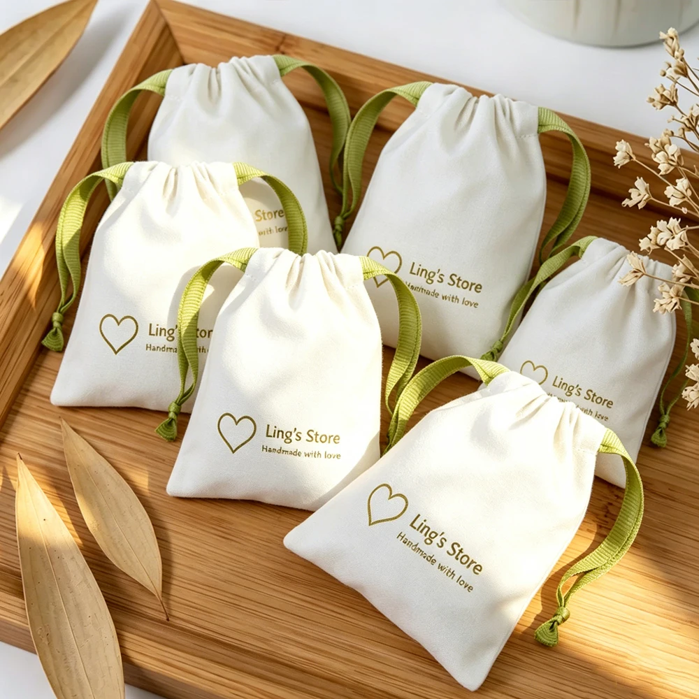 100 Stück Großhandel Personalisierte Weiße Baumwoll-Zugbeutel Schmuckverpackung Musselin-Leinwandbeutel Kosmetik Schlüsselanhänger Süßigkeiten-Aufbewahrung – Detail 1
