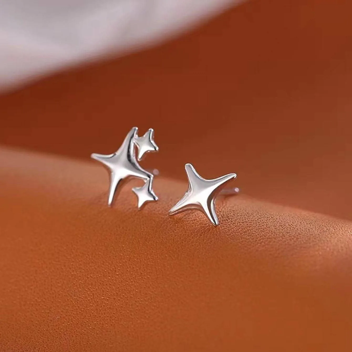 Asymmetric Silver Four Point Star Stud Earrings