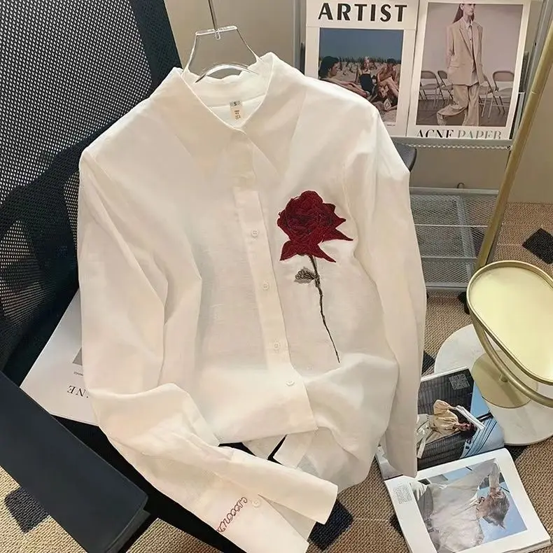 

White embroidered rose linen semi-transparent long-sleeved shirt female 2024 new design sense niche French blouse.