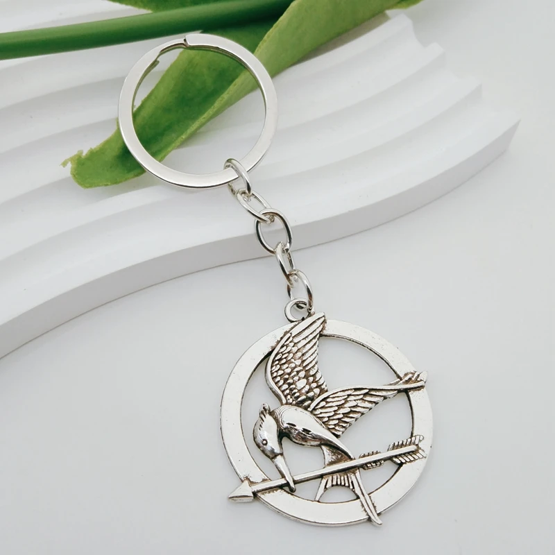 Creative new hungry bird logo alloy keychain hollow mockingbird wings pendant keychain jewelry gift