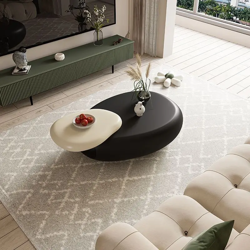 

Rotating coffee table cream style, living room movable designer, new high-end artistic sense