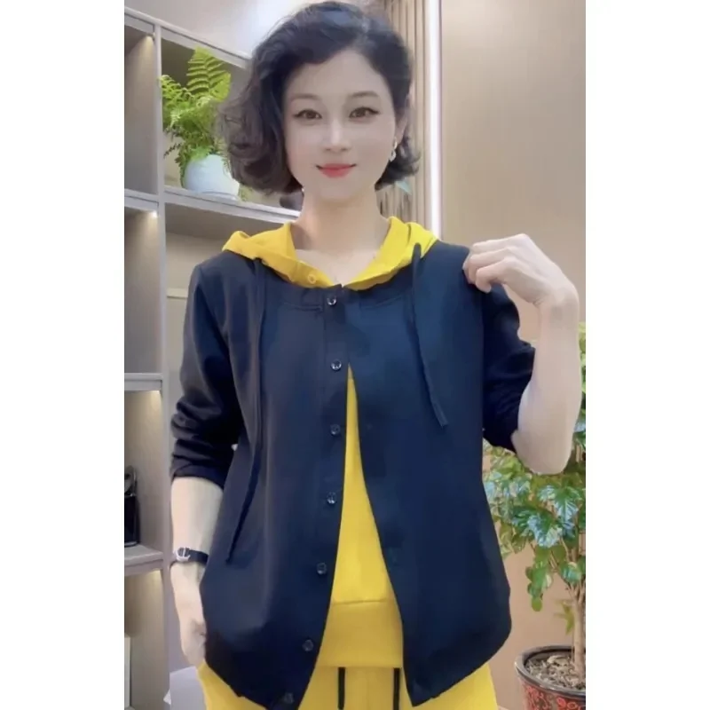 Giacca antietà per il tempo libero in cotone spaziale di alta qualità Primavera Estate Moda maglione a due pezzi finto con cappuccio a maniche lunghe