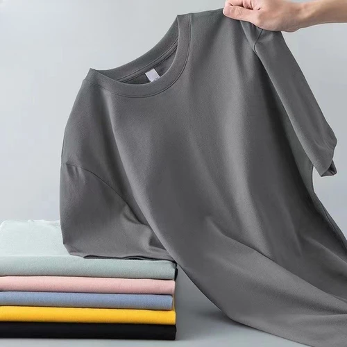 Imagen 2 del producto Camiseta 100% de algodón puro para hombre y mujer, camisa de manga corta con cuello redondo, versátil, holgada, de Color sólido