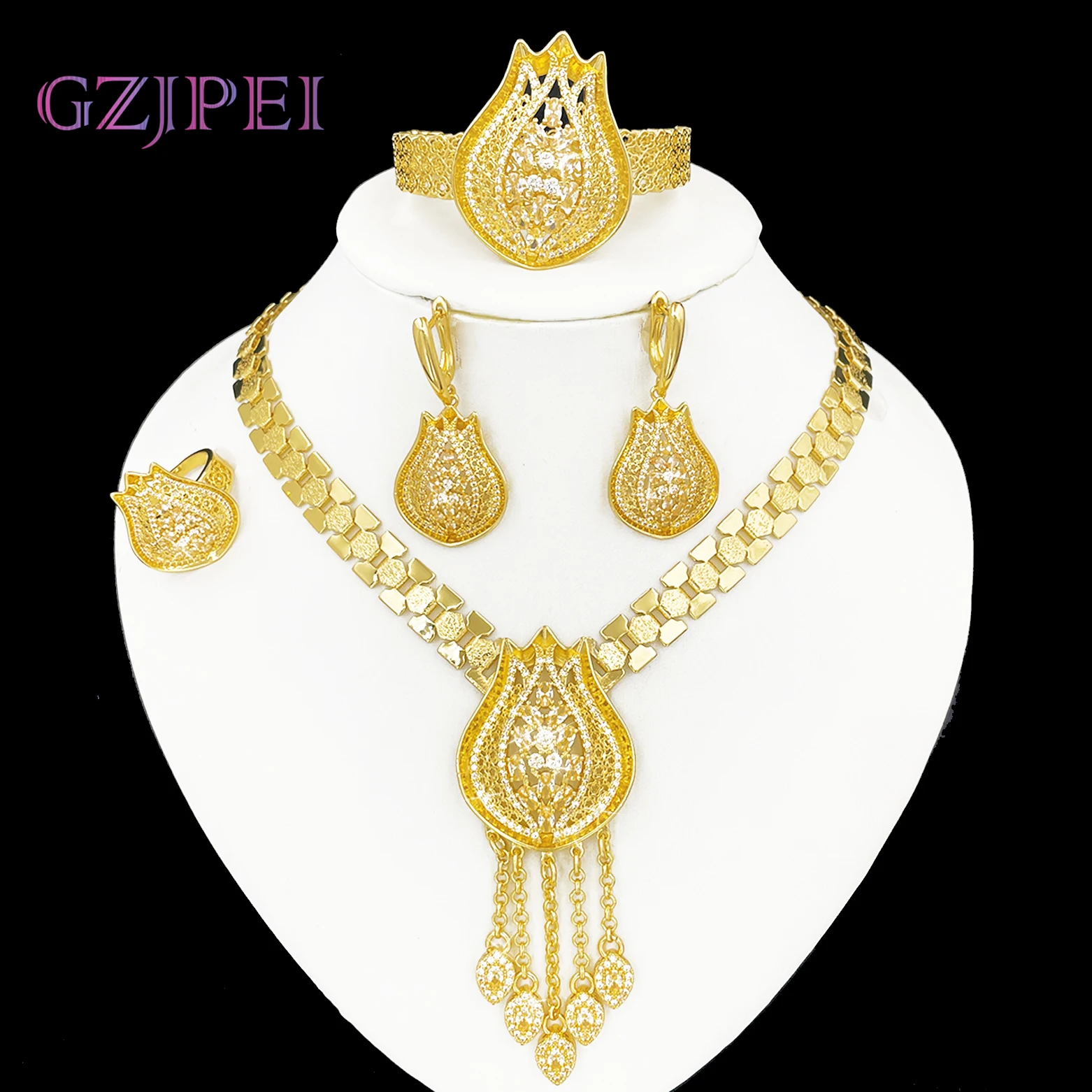 

GZJPEI Dubai Gold Color Hollow Jewelry Set Shiny White Zircon Tassel Necklace Bracelet Earring Ring 4Pcs/Set Wedding Jewellery