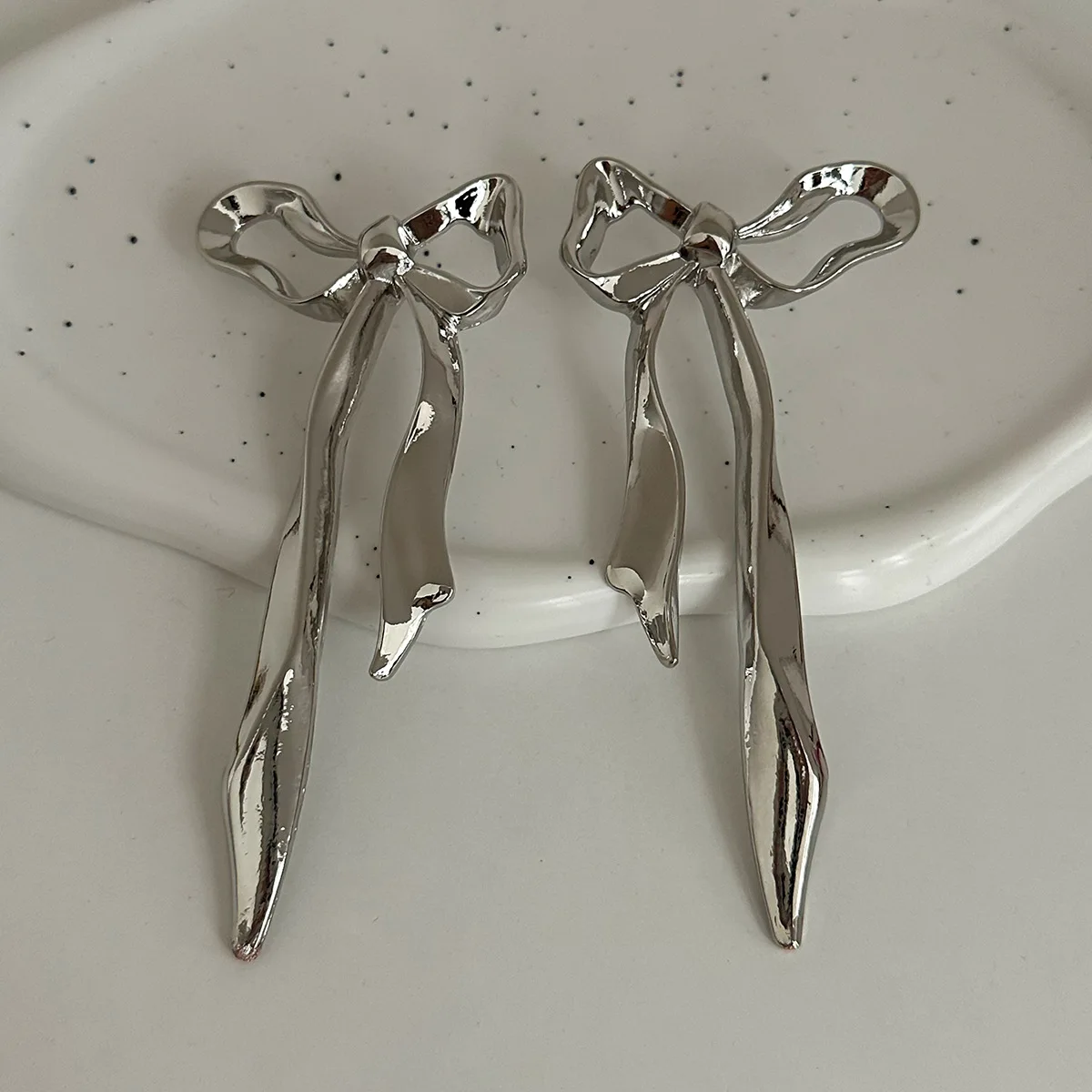 ins metal three-dimensional bow stud earrings, geometric irregular pleated corrugated smooth petal earrings