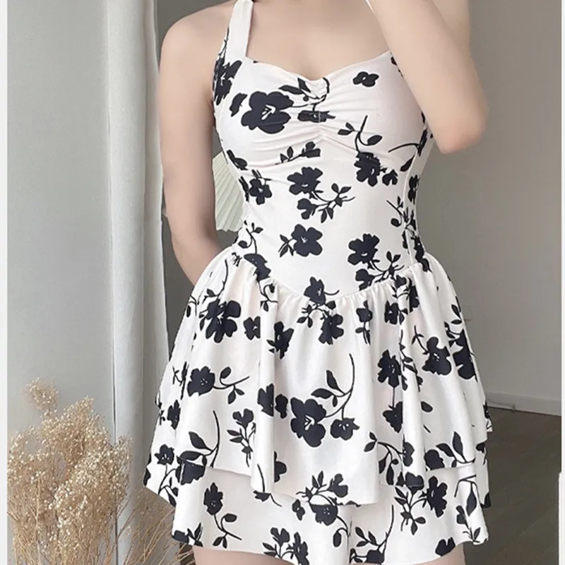 جديد 2025 الصيف قطعة واحدة الأسود زهرة طباعة ملابس السباحة للنساء الحلو ملابس السباحة مثير شريط حول ياقة الملابس عارية الذراعين فتاة ملابس عطلة الشاطئ