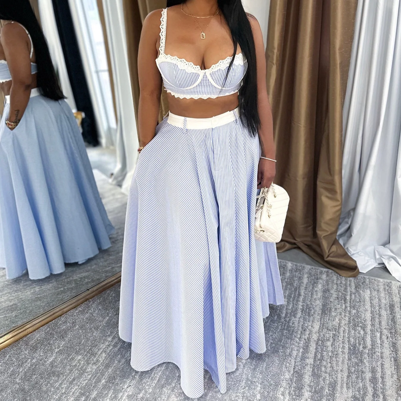 

European and American women's clothing: camisole with lace splicing, high-waisted midi skirt, striped two-piece set