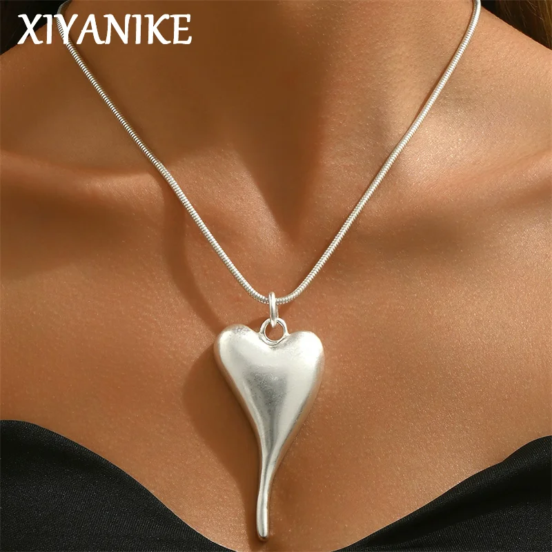 

XIYANIKE Unique Long Heart Pendant Necklace For Women Niche Fashion New Jewelry Accessories Lovers Gift Party Music Festival