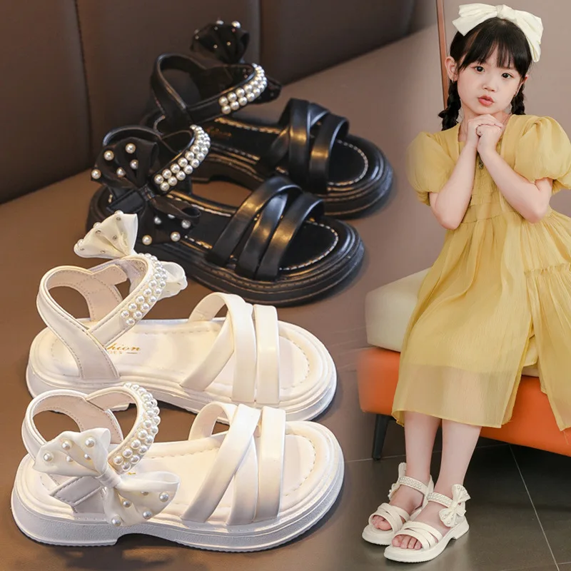 

New 2025 Children's Sandals for Girls Shoes for Kids Fashion Bow Tie Summer Soft Flat Heels Beach Princess Beaded Student Shoes