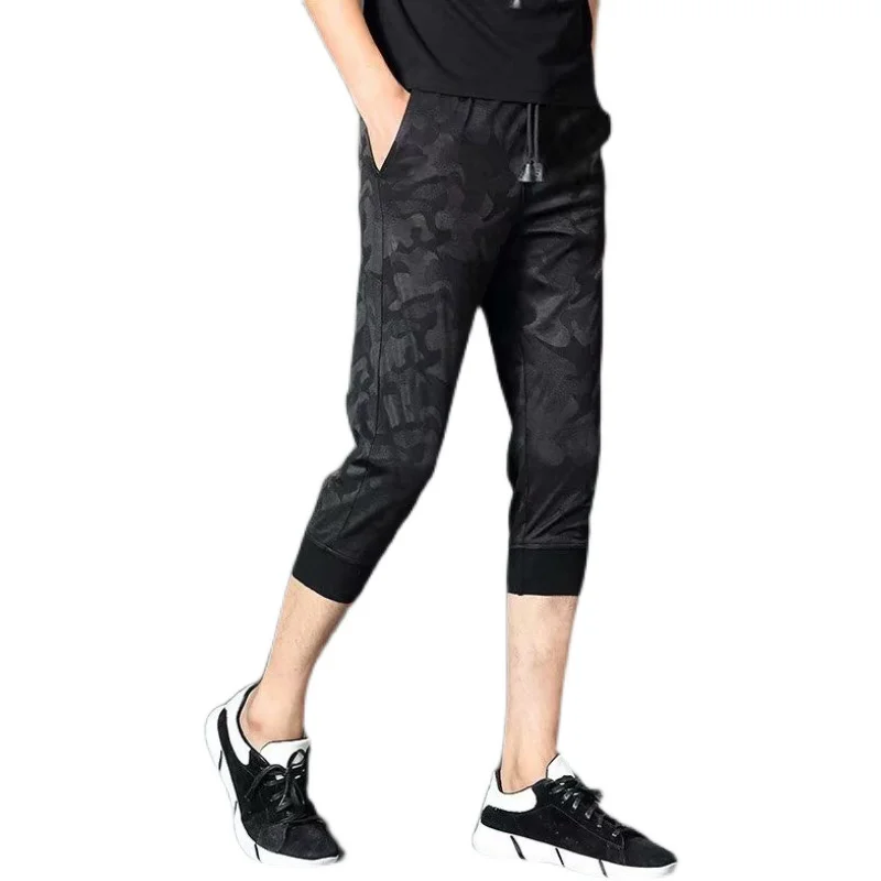 กางเกงขายาวทรงหลวมผ้าไหมน้ำแข็งสำหรับผู้ชาย ฤดูร้อน เนื้อผ้าบางเบา สปอร์ต ขาเจ็ดส่วน เอวสูง ผสมโพลีเอสเตอร์ ใส่สบาย ระบายอากาศได้ดี