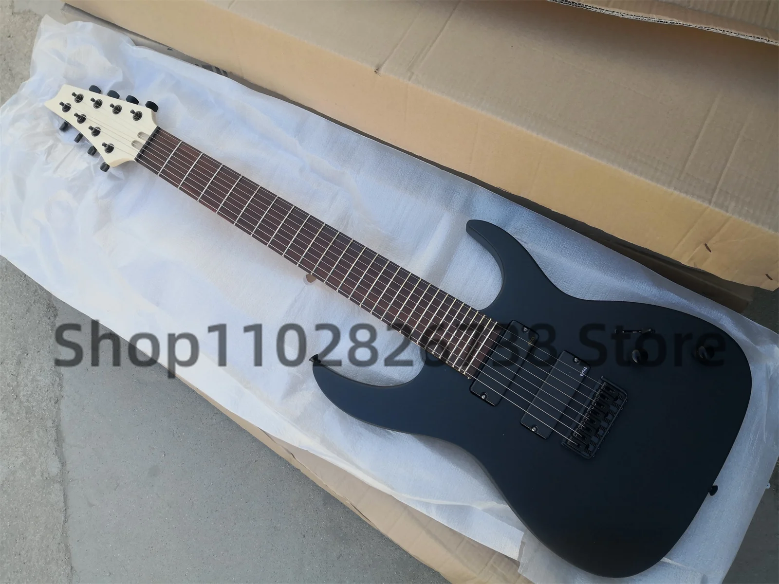 

8 Strings electric Guitar Matte Black body Rose wood fingerboard 24 Frets Maple neck Black Tuners Factory customization