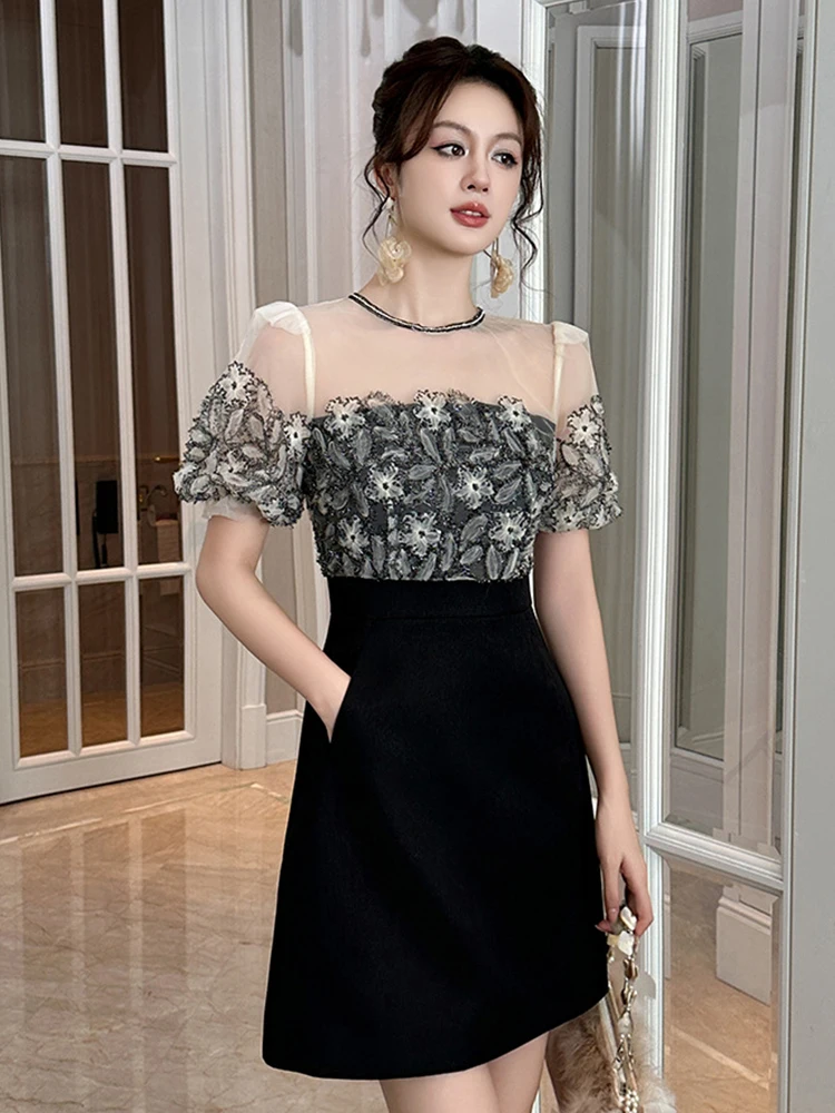 Vestido negro de estilo francés para Mujer, vestido corto Sexy de alta sociedad con empalme de encaje y bolsillo de malla transparente, Vestidos para fiesta y discoteca para Mujer