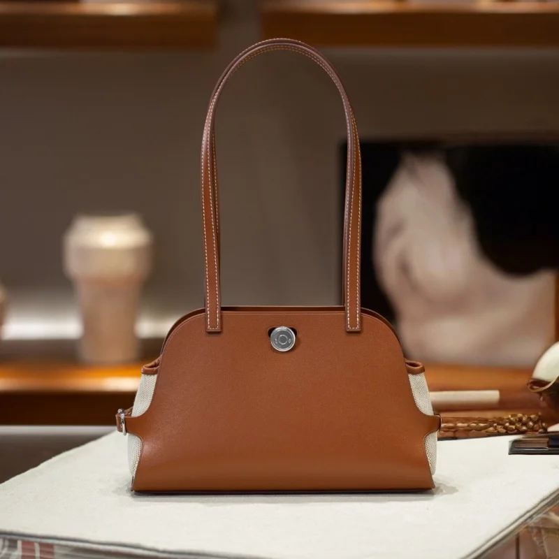 

2025 New Top-Grain Cowhide Women's Handbag. Niche Commuter Fashion Versatile Genuine Leather Shoulder Bag.