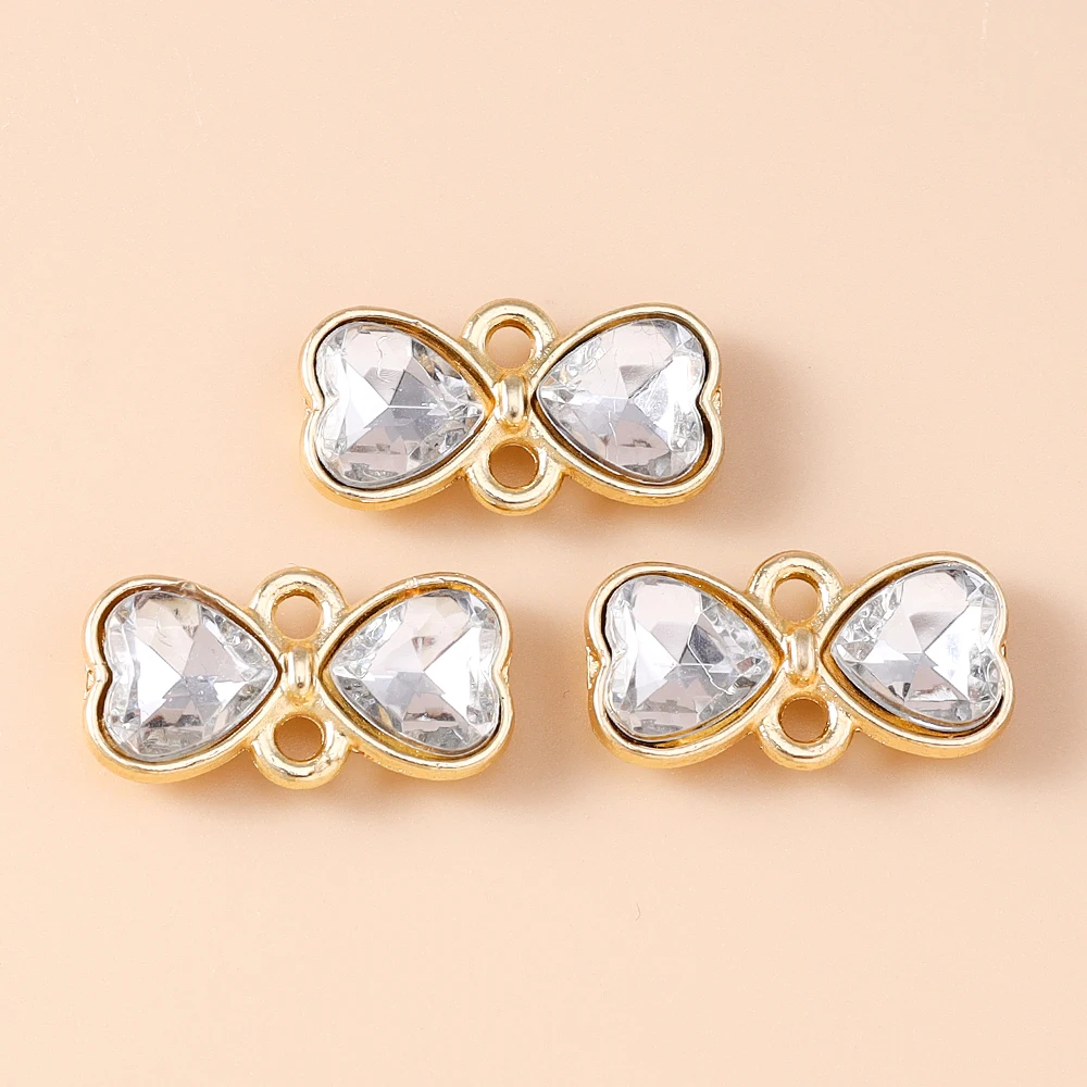 Leslie 10 Stück 12 x 14 mm zarte Doppelloch-Kristall-Bowknot-Charms-Anschlüsse für Halskette, Ohrringe, DIY-Schmuckherstellungszubehör – Detail 4