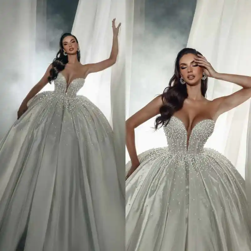 

Luxurious Wedding Dresses Sleeveless V-Neck Pearls Crystal Sequins Ball Gown Bride Gown Sweep Train Customized Vestido De Novia