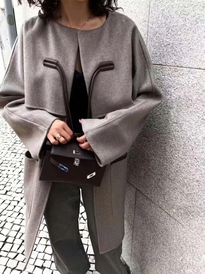 

Extremely simple style women's windbreaker fashionable, simple, loose, slimming and fake two-piece spliced cashmere coat