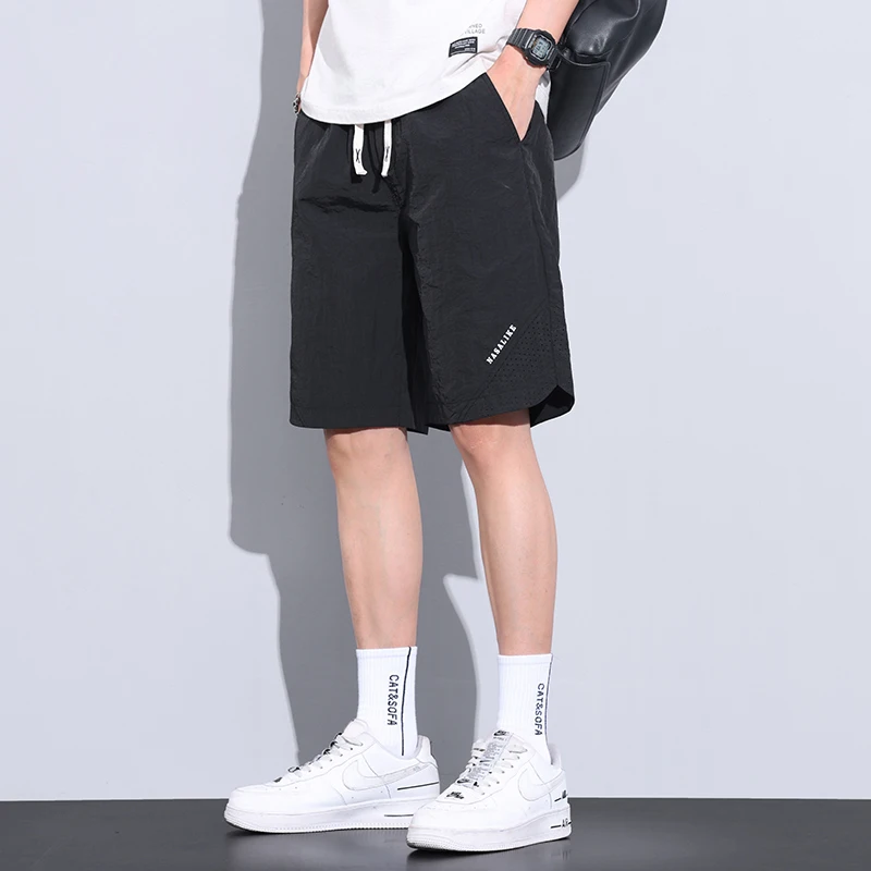 

2024 Summer Simple Solid Color Elastic Waist Drawstring Pocket Men's Loose Comfortable American Split Knee Length Casual Shorts