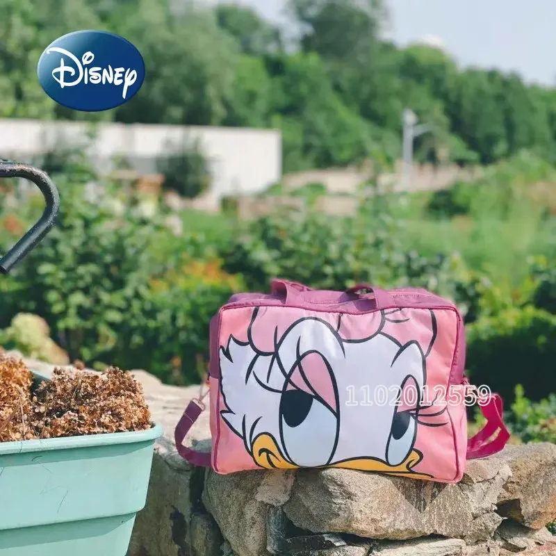 Nuevo bolso de viaje Disney Donald Duck para mujer, bolso de viaje portátil de dibujos animados, bolsa de almacenamiento impermeable de gran capacidad, alta calidad