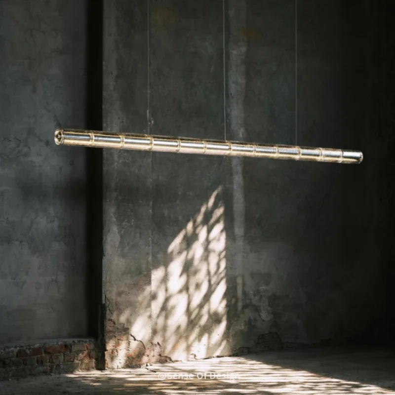 

Italy, one-word restaurant designer Nordic minimalist bar chandelier