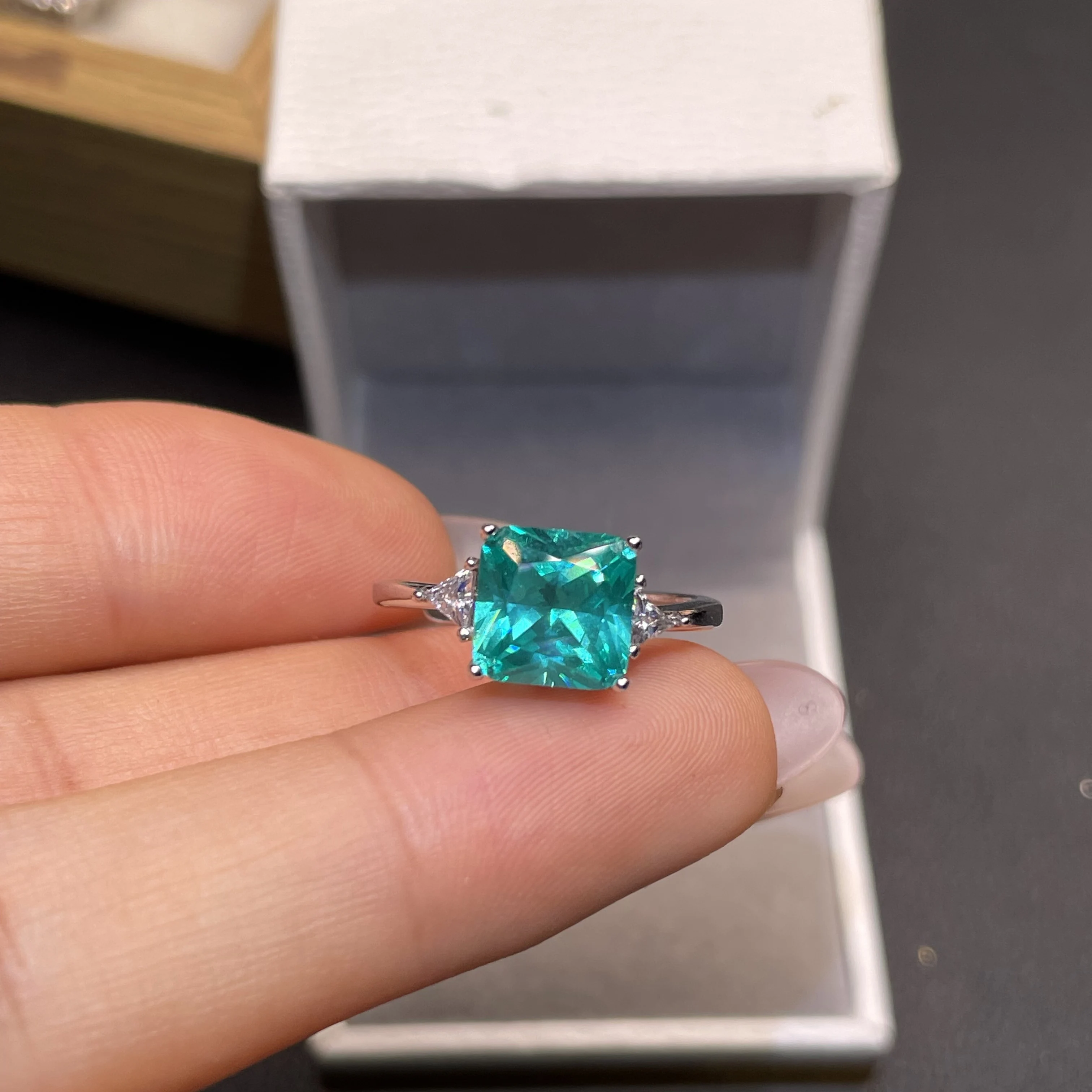 100% natural sky-blue paraiaba ring. Pure silver. Designed for women's weddings. Exquisite square-shaped high-end jewelry