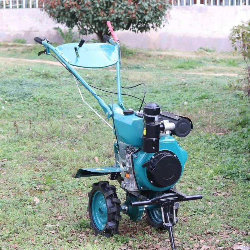 

Multifunctional hand-held micro-tiller plough trencher