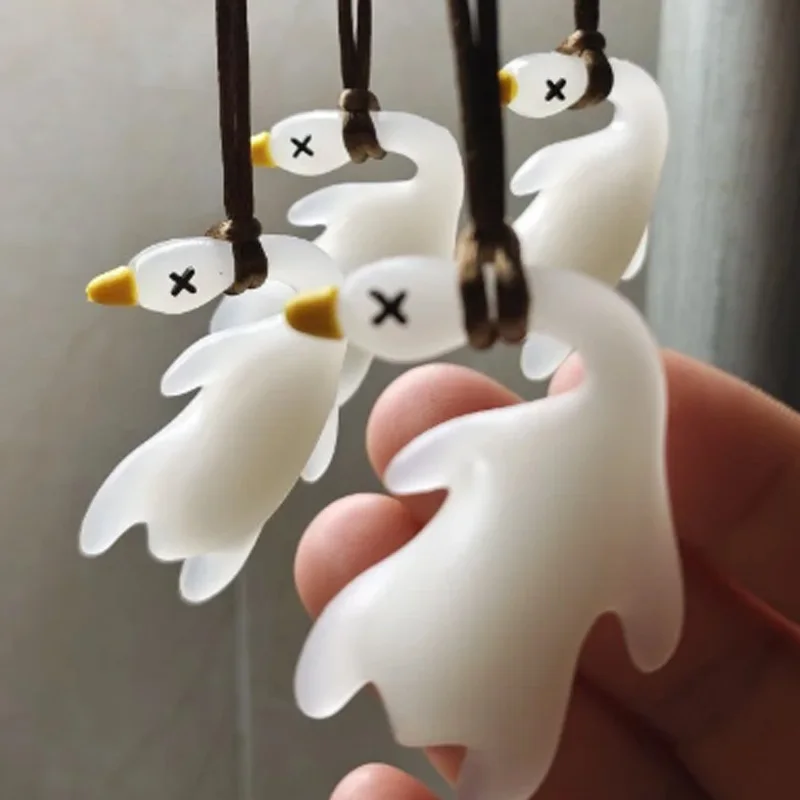 1/2pcs New Color Change Duck Keychain Fashion Funny Goose Pendants for Bag Car Keyrings Cute Cartoon UV Photochromic Key Chains image 6
