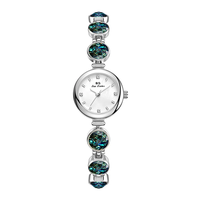 Orologio da donna al quarzo alla moda Orologi da donna impermeabili di marca di lusso Orologi da donna eleganti con bracciale con diamanti a forma di fiore