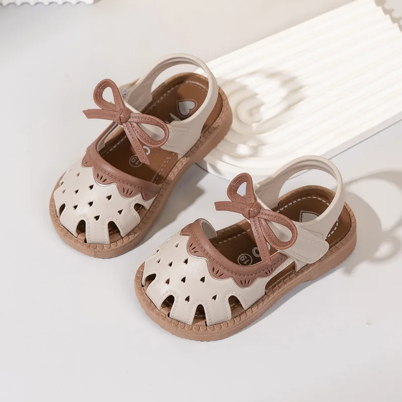 

2026 Summer Girls Flat Sandals Hollow-out Fashion Bowknot Elegant Children's Beach Sandals Non-slip Causal Kids Toddlers Sandals