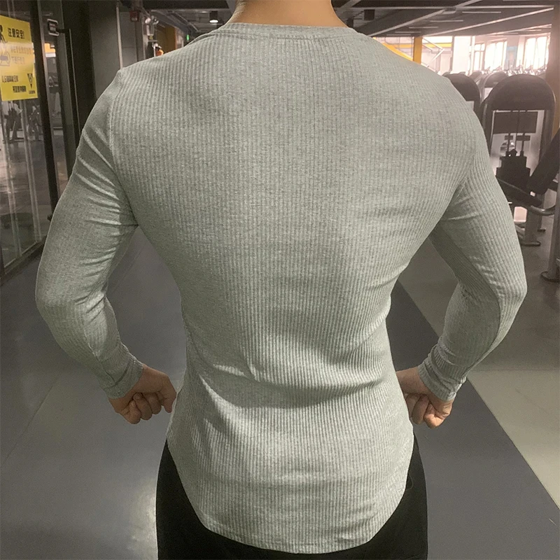 2024 Men\'s T-shirt sports long sleeved striped solid V-neck tight elastic running shirt.