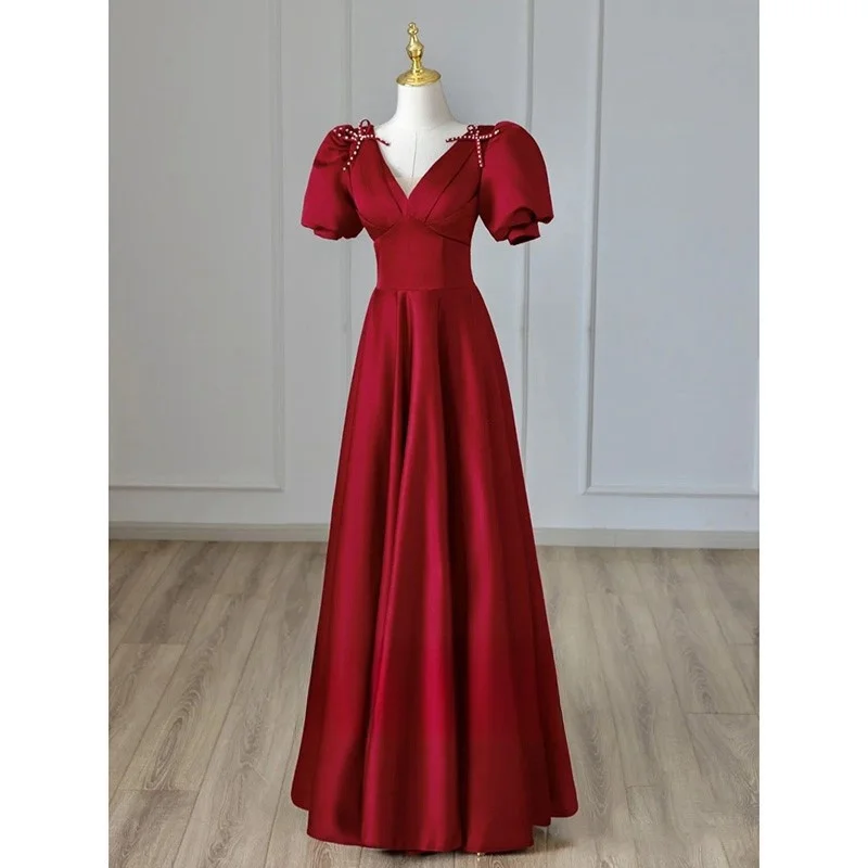 

A toast to the new Burgundy satin dress