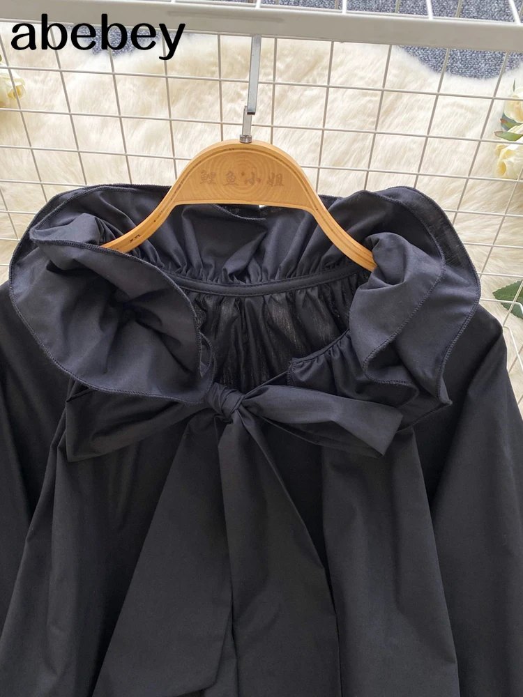 Elegancka bluzka z falbankami, stójką, długim rękawem i motywem motyli, w stylu vintage, luźna, francuska, idealna do biura, w stylu high street, na jesień 2026.