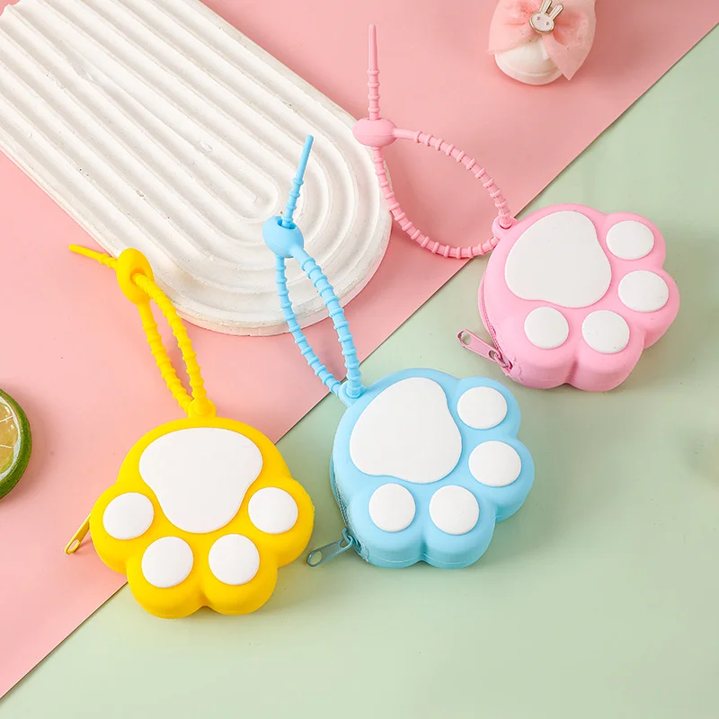 Porte-monnaie en silicone à motif de patte d'animal Kawaii, mini pochette portable pour écouteurs, portefeuille extensible multifonctionnel pour usage quotidien, cadeau