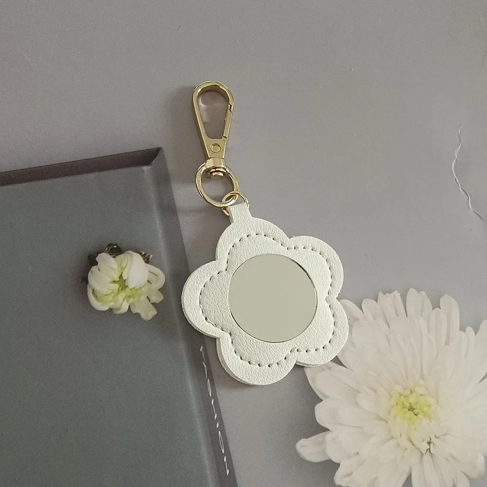 Nueva Mini mochila de cuero portátil, colgante, llavero, paquete de anillo, llavero con espejo de maquillaje, accesorio pequeño, llavero de regalo