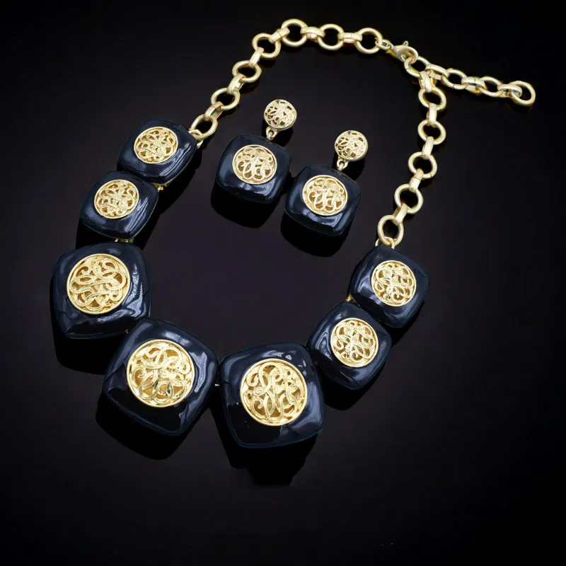 

Vintage enamel hollowed out patterned earring necklace set