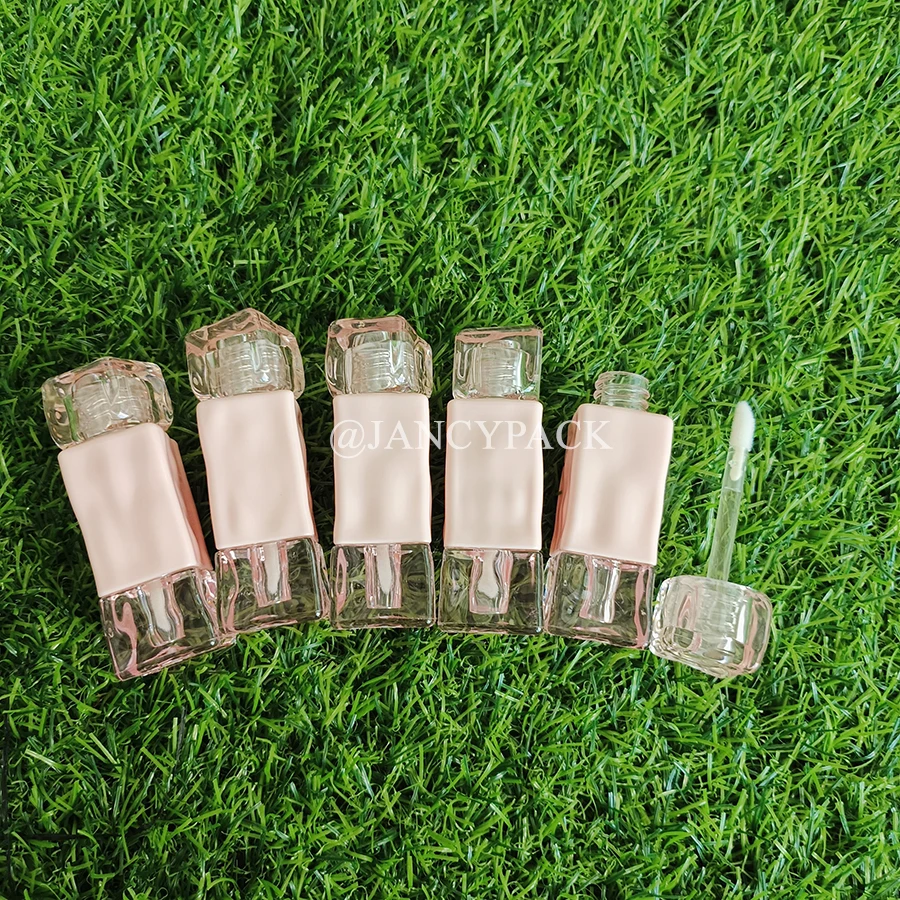 تصميم جديد 2 مل الوردي تويست فريد أنبوب ملمع الشفاه الفارغ أنابيب زيت الشفاه شعار مخصص تغليف مستحضرات التجميل