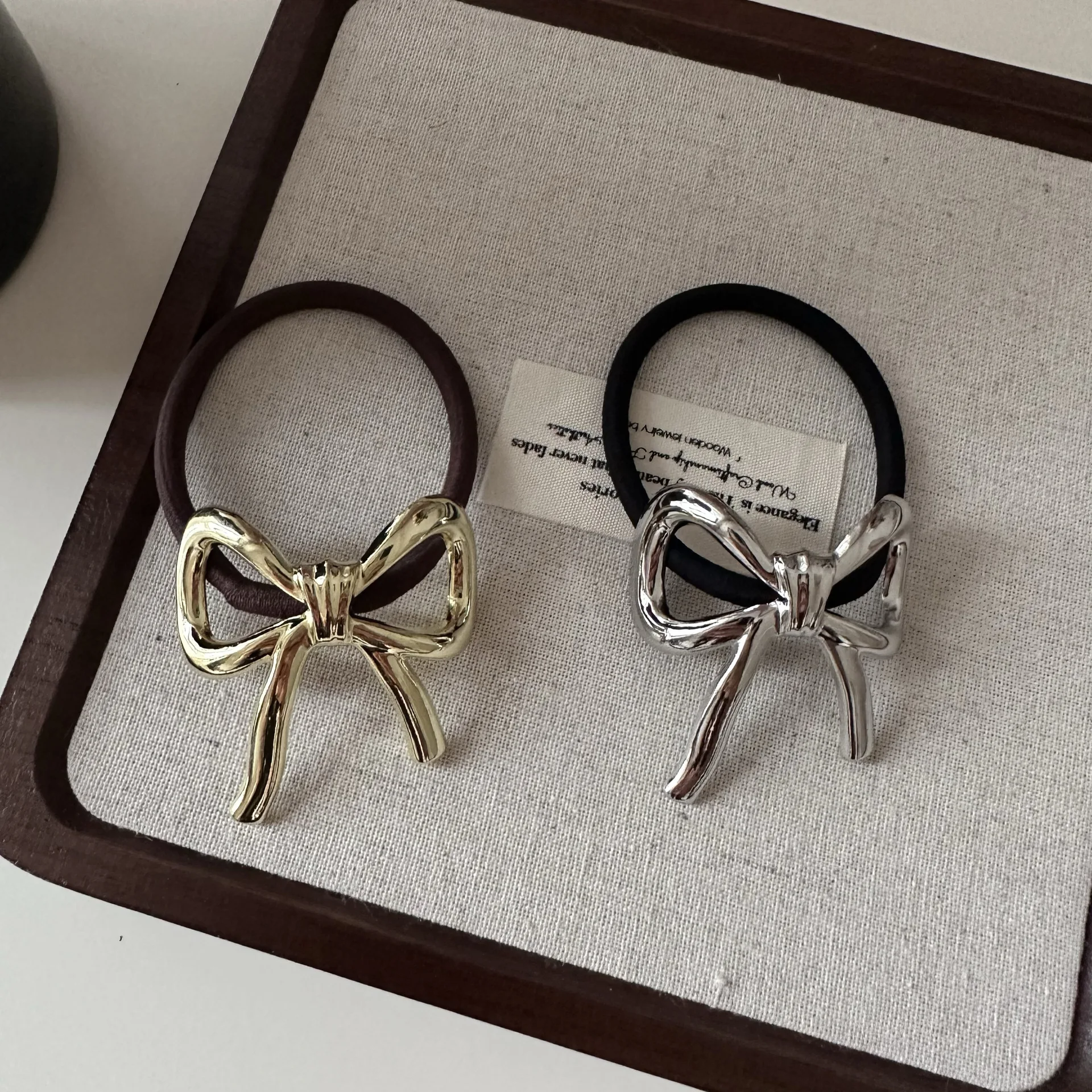 

Korean Metal Bowknot Hair band for Women High Ponytail Hair Tie Fashionable and Elegant Multi-functional Hair Accessory