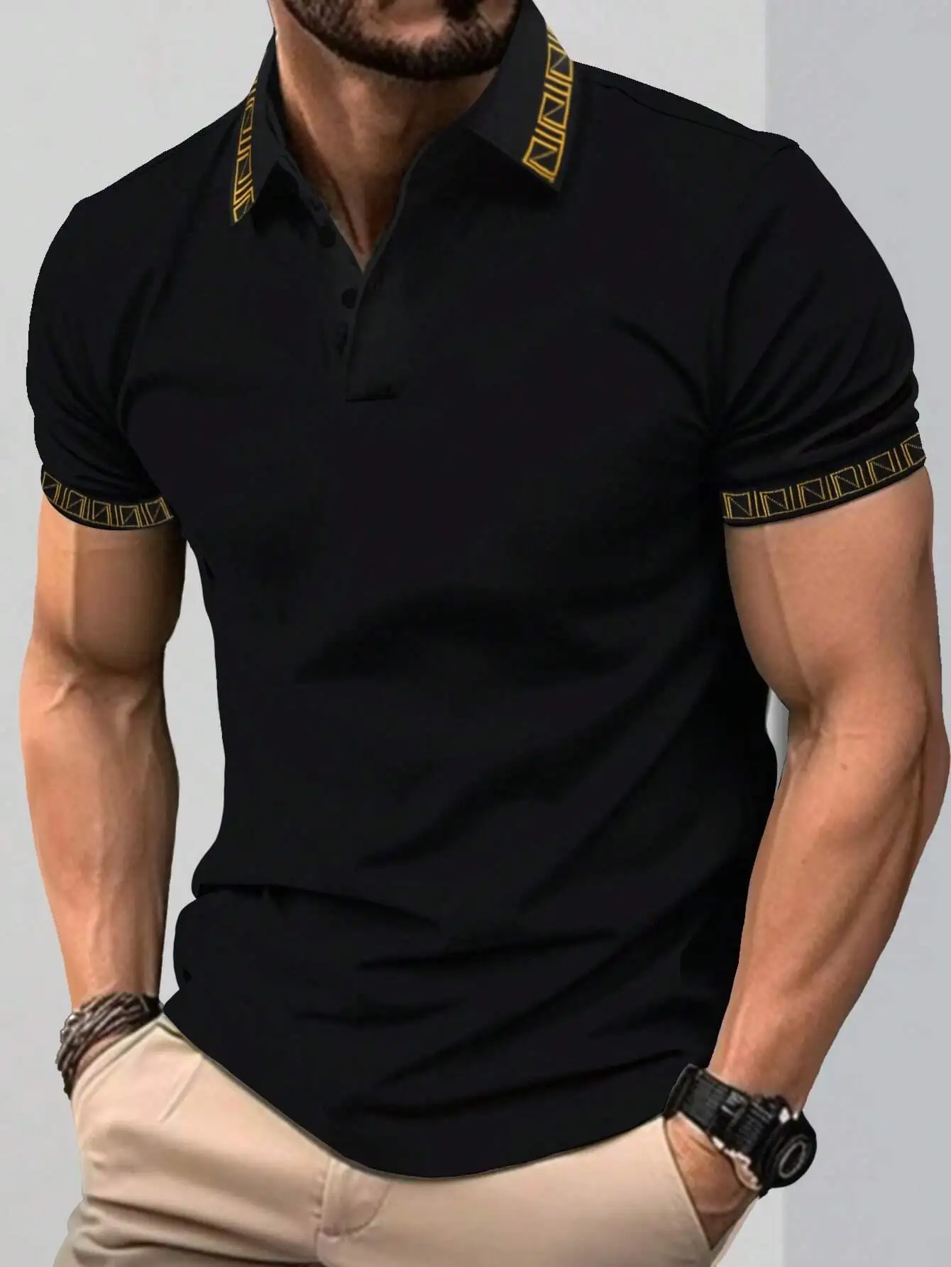 

Men's Black Polo Shirt with Gold Geometric Trim on Collar and Cuffs