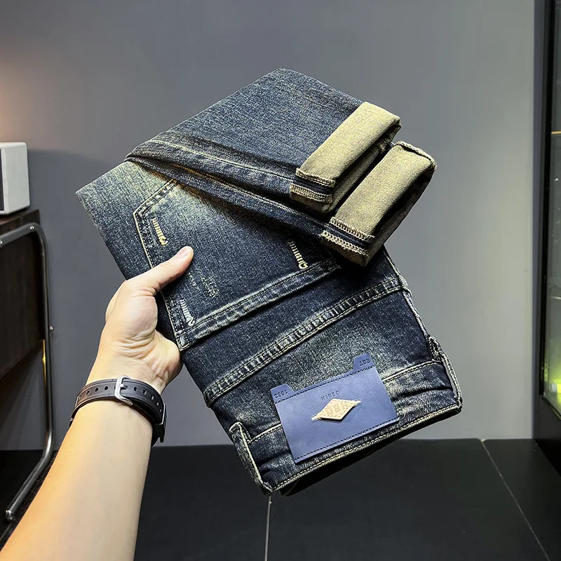 Celana Jeans biru Vintage untuk pria, celana Denim pas badan kasual pudar modis cuci gudang tren musim gugur dan musim dingin baru 2024