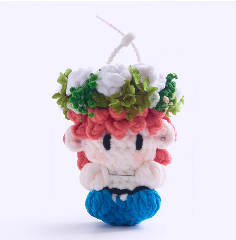 Gummy bear-themed merchandise, handmade crocheted dolls, concert support materials, and keychains.